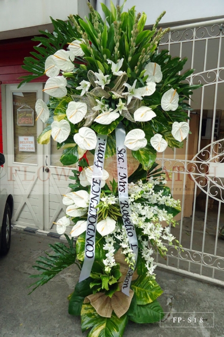 Standing Arrangement of White Anthuriums, Casablanca Lilies, Orchids & Tuberoses | Sympathy & Funeral Flowers Delivery