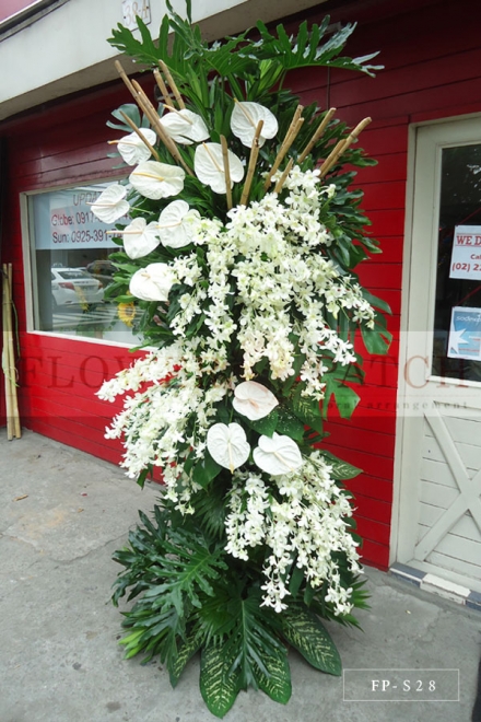 Standing Arrangement of White Orchids & Anthuriums | Sympathy & Funeral Flowers Delivery