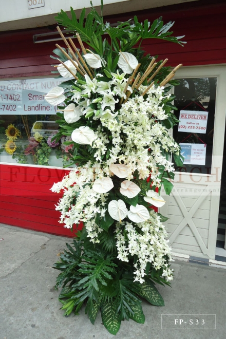 Standing Arrangement of Orchids, Anthuriums and Casablanca Lilies | Sympathy & Funeral Flowers Delivery