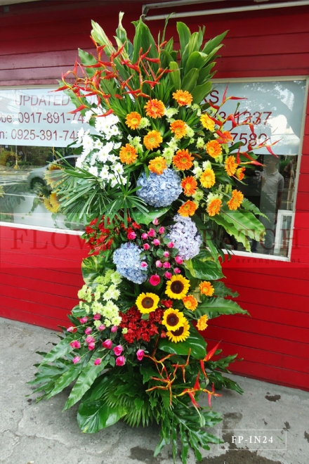Standing Arrangement of Sunflowers, White and Green Mums, Roses, Alstromerias, Heliconias and Hydrangeas