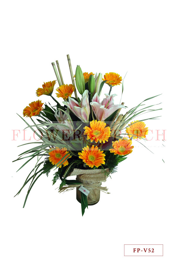 1 Dozen Gerberas and 2 Stems of Stargazer Lily in a Vase