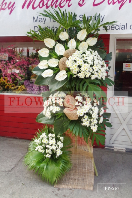 3 Layer Standing Arrangement of White Anthuriums & Mums | Sympathy & Funeral Flowers Delivery
