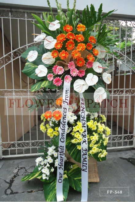 Standing Arrangement of White Anthuriums, Gerberas, Mums, and Tuberoses | Sympathy & Funeral Flowers Delivery