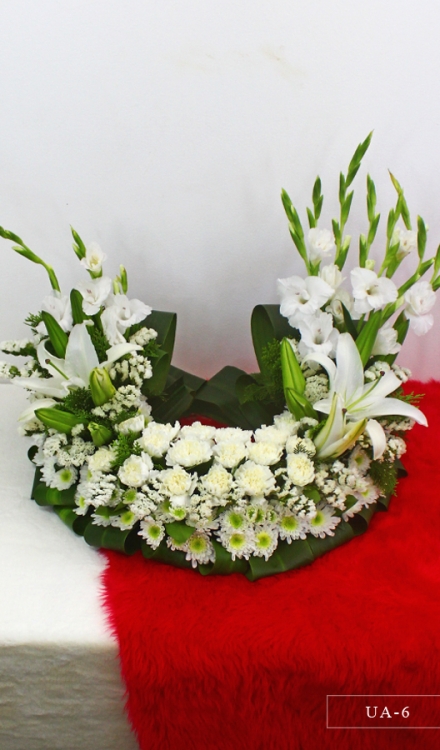 Urn Arrangement of Casablanca Lilies, Carnations, Mums, Gladiolus and Statice