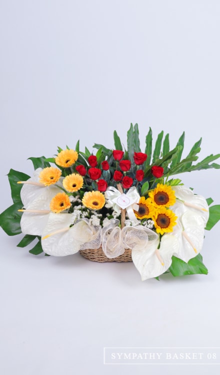 Sympathy Basket of Anthuriums, Gerberas, Sunflowers and Roses