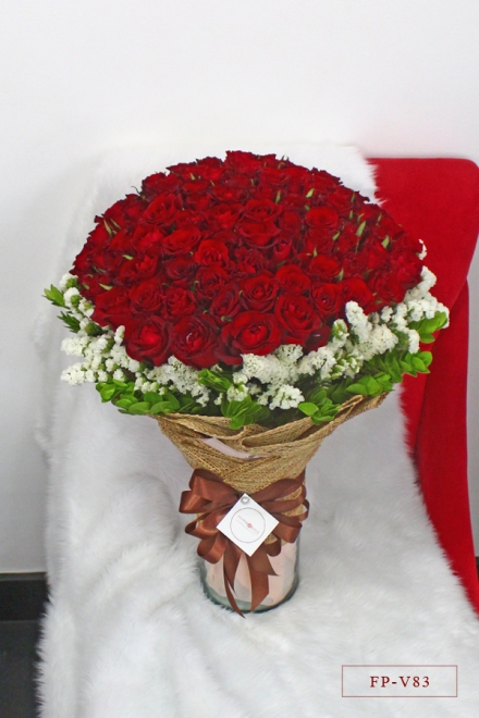80 Red Imported Roses in a Vase