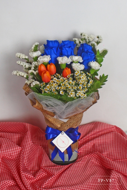 6 Ecuadorian Roses, 6 Carnations & 4 Tulips in a Vase