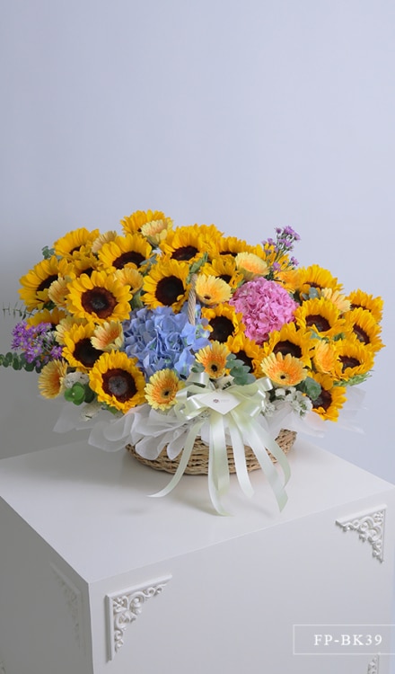 24 Sunflowers and 15 Gerberas in a Basket