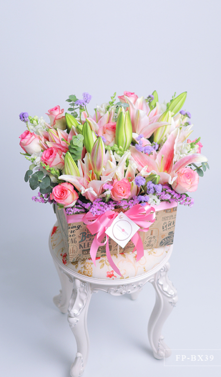 4 Stems of Stargazer Lily & 9 Imported Roses in a Box