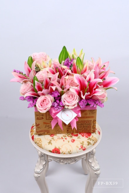 4 Stems of Stargazer Lily & 9 Imported Roses in a Box