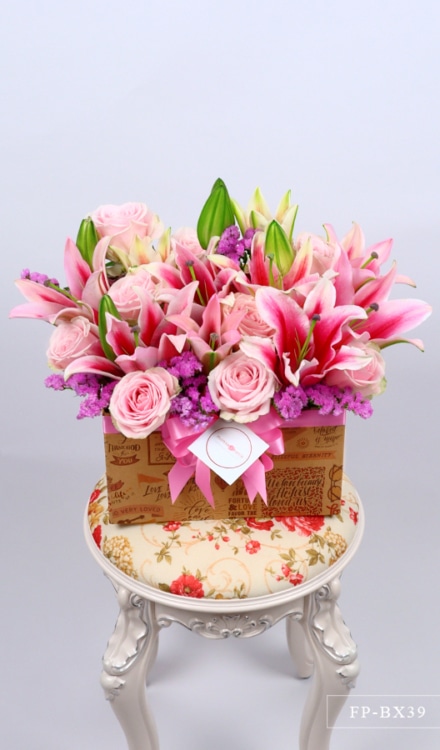 4 Stems of Stargazer Lily & 9 Imported Roses in a Box