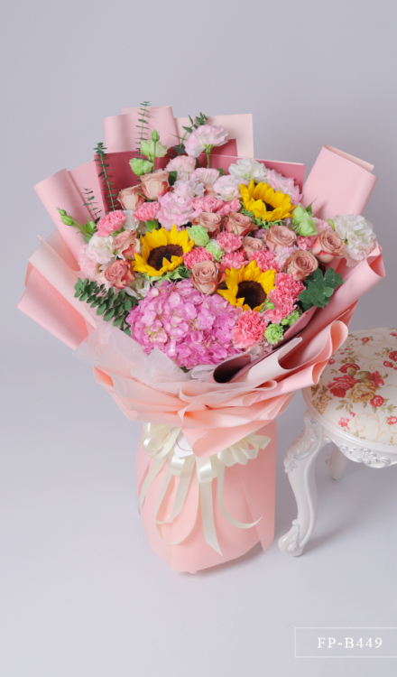 Bouquet of 1 Dozen Stems of Lisianthus, 1 Hydrangea, 1 Dozen Carnations, 10 Imported Roses and 3 Sunflowers