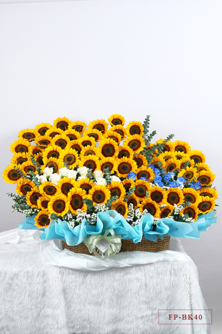 70 Sunflowers, 2 Dozen Imported Roses in a Basket