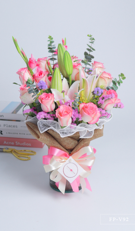 1 Dozen Imported Roses and 1 Stem Stargazer Lily in a Vase