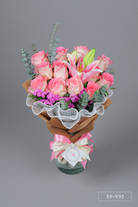 1 Dozen Imported Roses and 1 Stem Stargazer Lily in a Vase