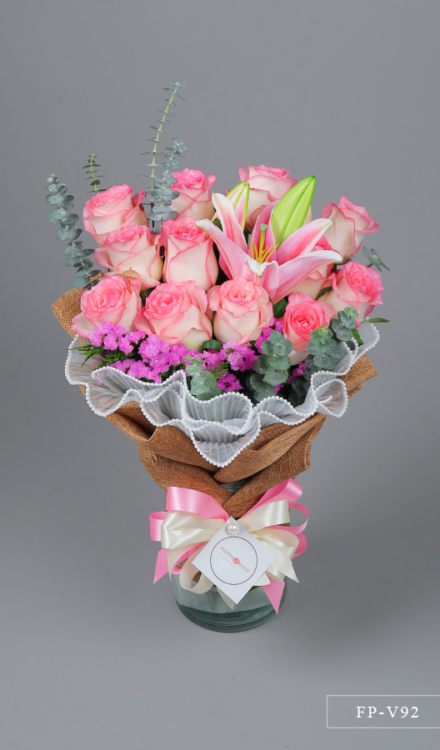 1 Dozen Imported Roses and 1 Stem Stargazer Lily in a Vase