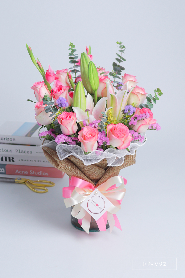 FP-V92 1 Dozen Imported Roses and 1 Stem Stargazer Lily in a Vase