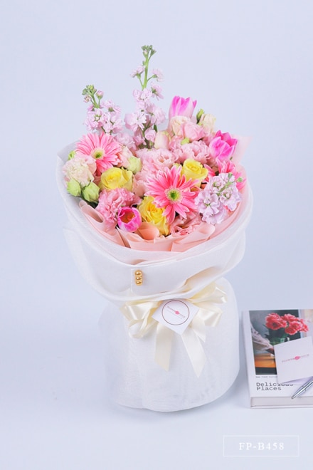 Bouquet of 3 Tulips, 6 Stems of Lisianthus, 3 Gerberas, 3 Imported Roses and 3 Matthiolas