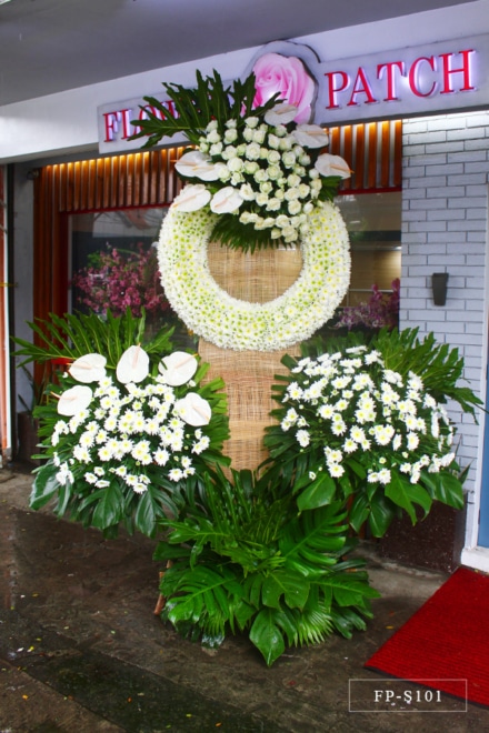 Wreath Arrangement of White Anthuriums, Roses & Mums