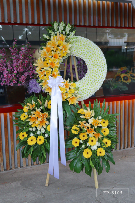 Wreath Arrangement of Yelloween Lilies, Gerberas, Roses, Mums & Snapdragons