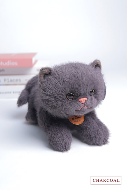 Charcoal cat stuffed toy