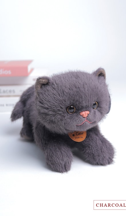 Charcoal cat stuffed toy