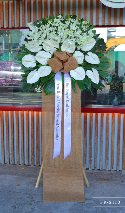 Standing Arrangement of Orchids and White Anthuriums