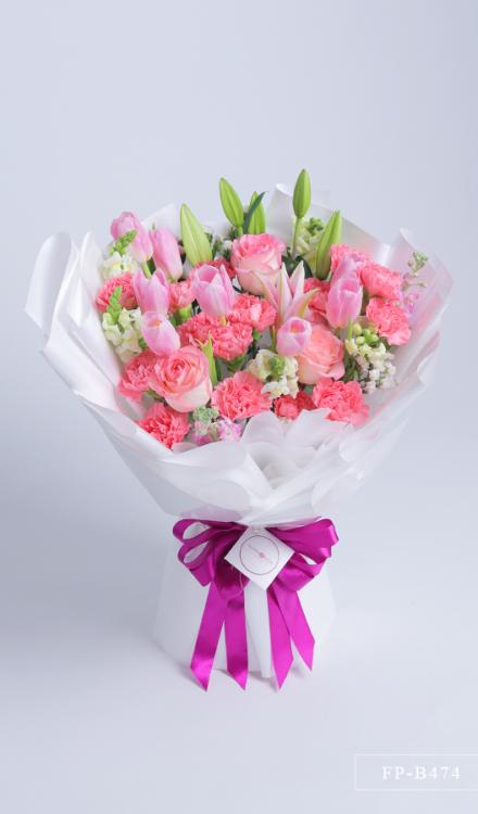 Bouquet 8 Tulips, 3 Impoted Roses, 2 Stems of Stargazer Lily and 15 Carnations