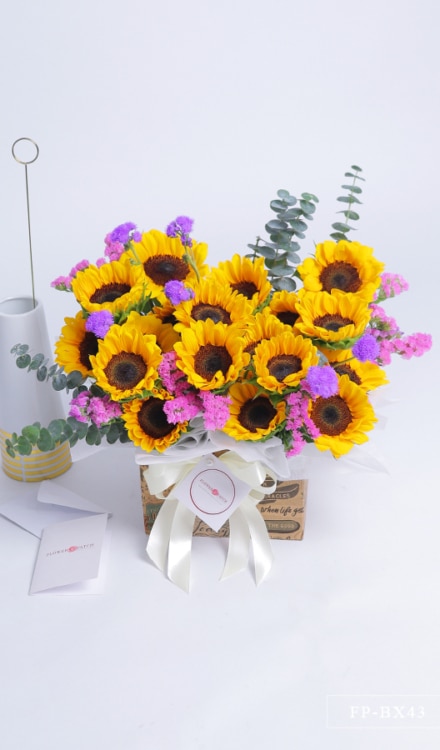 18 sunflowers in a box