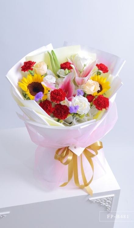 Bouquet of 8 Carnations, 3 Lisianthuses, 2 Sunflowers, 4 Imported Roses and 1 Stem Stargazer Lily