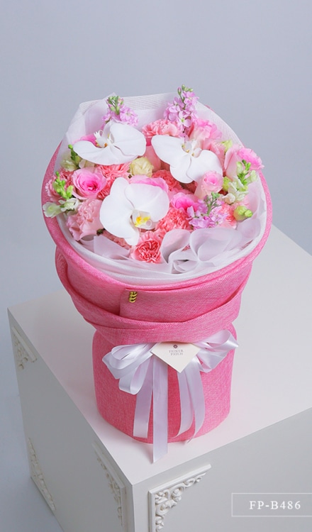 Bouquet of 8 Imported Roses, 10 Carnations, 6 Stems of Lisianthus and 3 Phalaenopsis Orchids