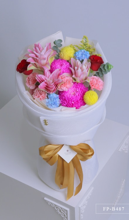 Bouquet of 2 Sunlight Mums, 2 Ping Pong Mums, 8 Carnations, 2 Imported Roses and 1 Stem Double Petal Lily