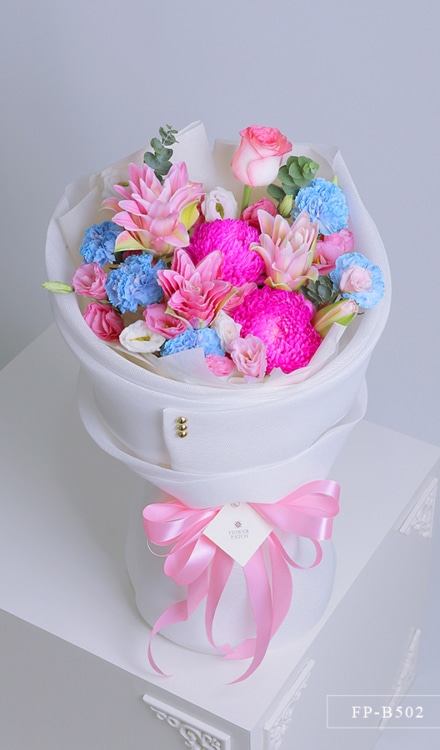Bouquet of 1 Stem of Double-Petal Stargazer Lily, 2 Sunlight Mums, 6 Stems of Lisianthus, 5 Carnations and 1 Imported Rose